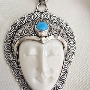 Carved Face Sterling Silver And Gemstone Pendant